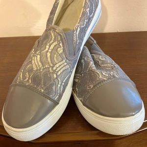 Lace covered sneakers